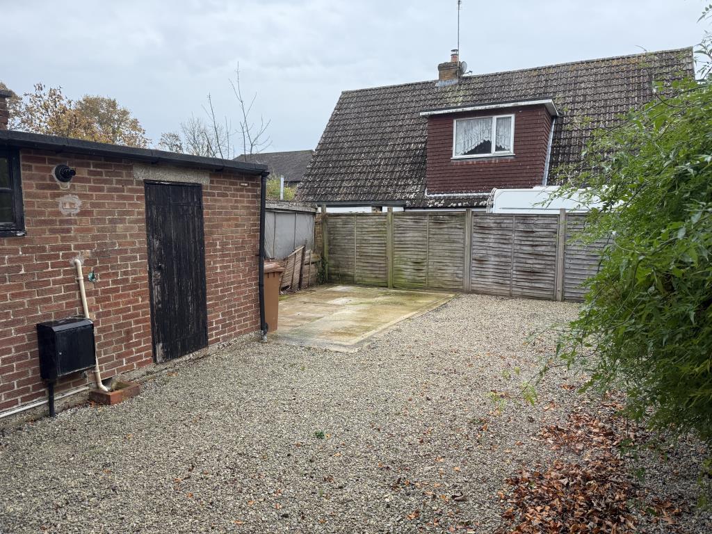 Lot: 11 - HOUSE IN NEED OF IMPROVEMENT - Rear yard of Semi in Wealden Village